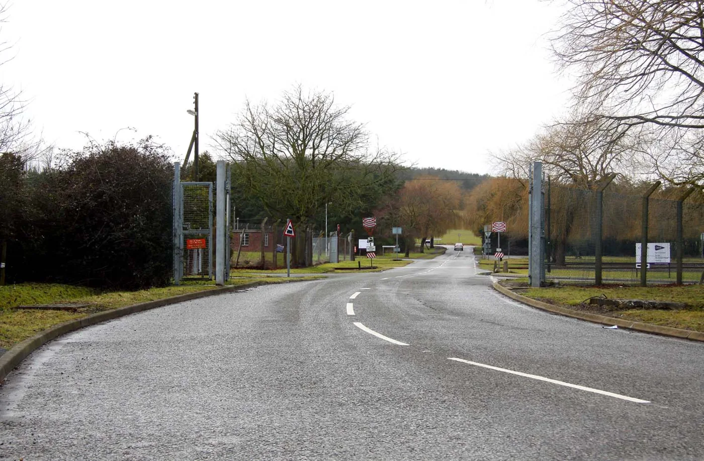 The gated entrance to the MOD storage and distribution centre at Bicester, photographed in 2010. The application covers Site A within the wider estate, off the B4011
